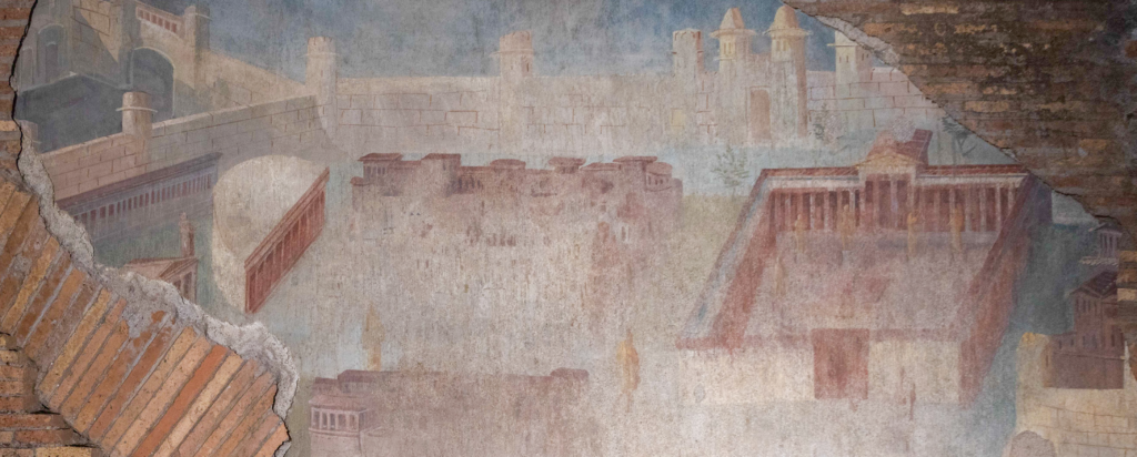 Dettaglio “Città Dipinta”: la raffigurazione a volo d’uccello di un centro urbano fortificato del I sec. d.C. restaurata nella galleria sotterranea delle Terme di Traiano